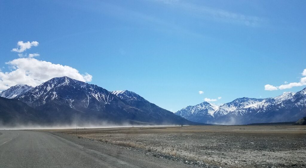 Sand being blown down the Slims River into Kluane Lake.